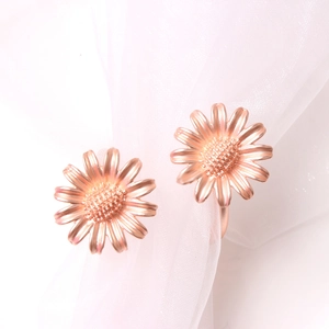 Rose gold daisy napkin rings with metallic finish for elegant hotel table decoration