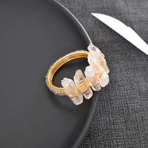 Handcrafted napkin ring with natural clear quartz crystal and gold woven wire detail