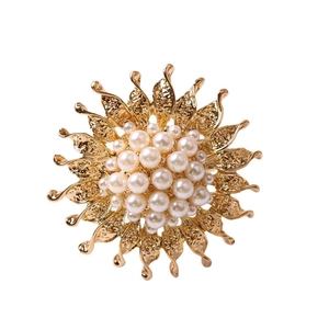Elegant gold sunflower napkin ring with white pearls for luxury table decoration