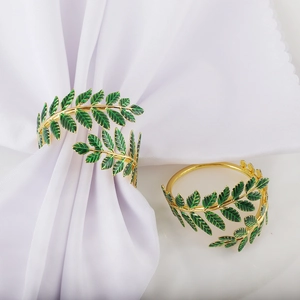 Minimalist gold leaf napkin ring with green enamel finish for elegant wedding table decor