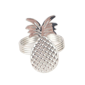 Silver pineapple napkin ring with textured metal finish and tropical leaf design