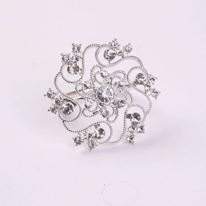 Elegant hollow floral napkin ring in silver finish with sparkling rhinestone accents