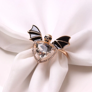 Gothic bat and skull napkin ring with rose gold plating and sparkling crystal accents