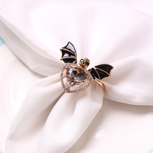 Gothic Halloween ring featuring a skull bat design with a large heart-shaped crystal stone