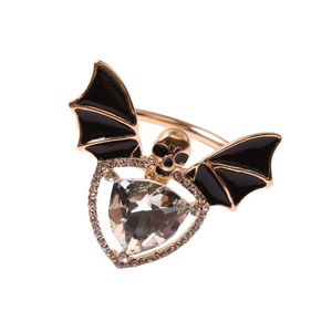 Gothic rose gold napkin ring with skull bat wings and triangular crystal stone