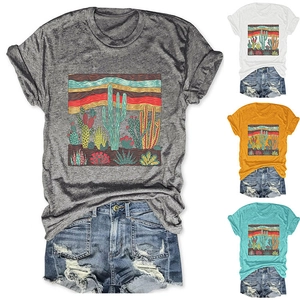 Detail showing various colors of desert cactus print t-shirts with casual denim shorts