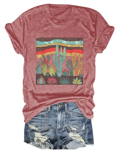 Detail of desert cactus print on brick red t-shirt paired with frayed denim shorts