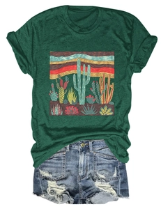 Flat lay of a dark green cactus print cotton t-shirt paired with distressed denim shorts