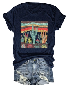 Flat lay of navy desert cactus t-shirt paired with frayed denim shorts on white background