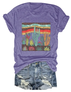Close-up of casual purple t-shirt with cactus art print and ripped denim shorts