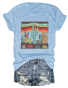 Flat lay of light blue cactus print T-shirt and distressed denim shorts set