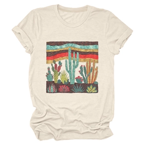 Detail of desert cactus print on a soft beige cotton crewneck short sleeve t-shirt