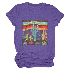 Detailed view of cactus and succulent print on purple short sleeve t-shirt fabric