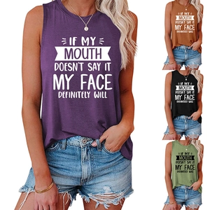 Detail of plus size tank top showing multiple colors and creative slogan print