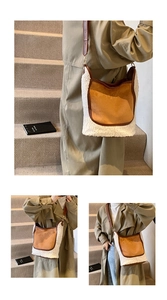 Detail showing plush lamb wool and brown suede contrast patchwork on a bucket bag