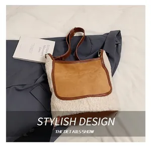 Detail showing plush lamb wool and brown suede contrast stitching on bucket bag