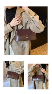 Vue détaillée du sac porté épaule marron foncé avec texture daim et boucle dorée