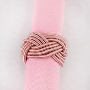Pink hand-woven knot napkin ring for elegant wedding and dining table decoration