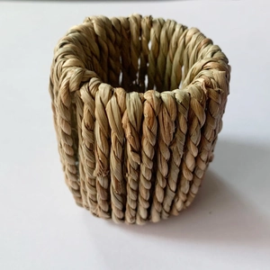 Handcrafted natural woven grass napkin ring for elegant table settings and rustic decor