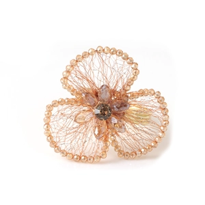 Elegant gold filigree flower napkin ring with champagne beads and brown crystals