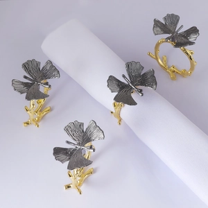 Set of 4 elegant silver bow and gold branch napkin rings for wedding table decor