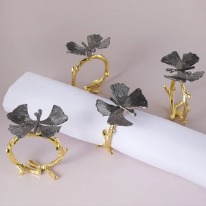 Set of 4 gold and grey butterfly napkin rings for elegant wedding table decorations