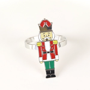 Detailed view of colorful enamel nutcracker soldier napkin ring with shiny silver base