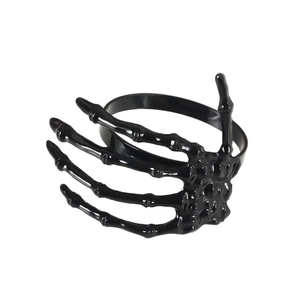 Gothic black skeleton hand napkin ring with a glossy finish for Halloween table decor
