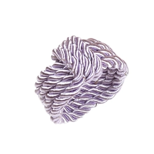 Handwoven purple and white spiral napkin rings for elegant wedding table settings
