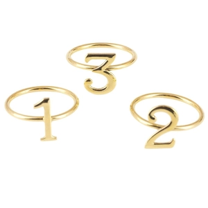 Three-piece set of golden numeral 1 2 3 napkin rings for festive dining table decor