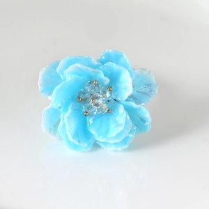 Handcrafted blue acrylic floral napkin ring with crystals for spring table decoration