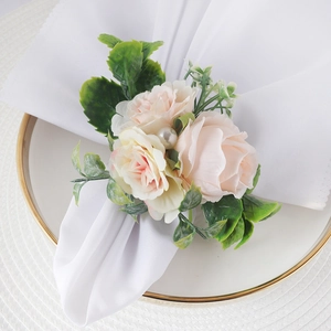 Elegant rose napkin ring with pink and beige flowers, green leaves and a white pearl