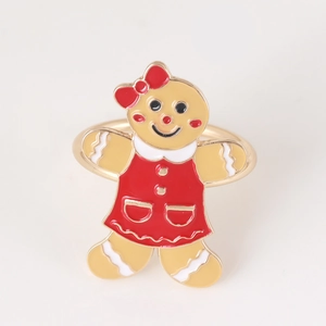 Gingerbread girl Christmas napkin ring with red bow and gold-plated alloy base
