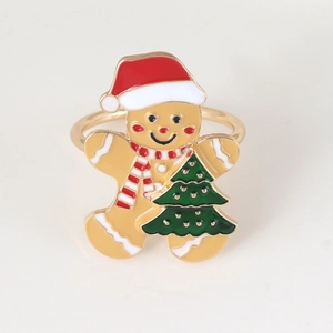 Gingerbread man and Christmas tree napkin ring with gold finish and enamel detail