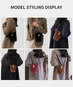 Detailed views of vintage suede bucket bag showing leather straps and metal buckles