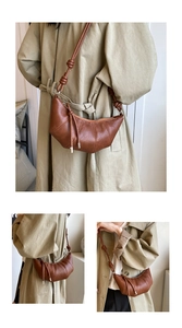 Three perspectives of brown faux leather croissant bag with adjustable knotted strap