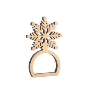 Portatovagliolo a fiocco di neve in legno naturale con intaglio laser su sfondo bianco