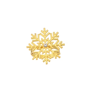 Golden snowflake napkin ring with crystal center for elegant Christmas table decoration