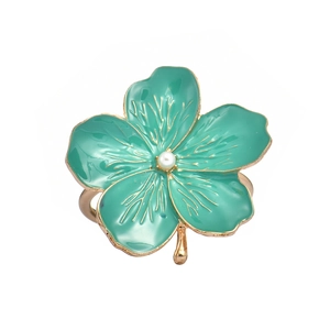 Elegant gold plum blossom napkin ring with green enamel petals and a small white pearl