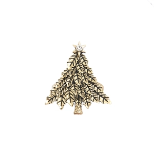 Green Christmas tree napkin ring in vintage gold alloy with star zircon and textured leaves