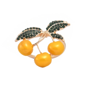 Creative cherry napkin ring with yellow enamel fruit and green crystal leaves
