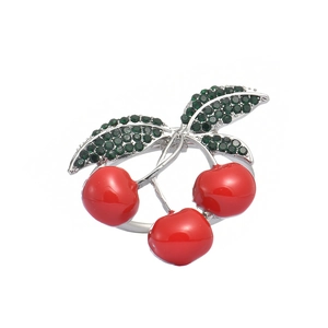 Elegant cherry napkin ring with green crystal leaves and red enamel fruit on silver base