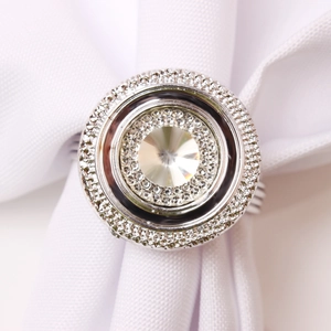 Elegant silver napkin ring with central crystal and sparkling rhinestone circles