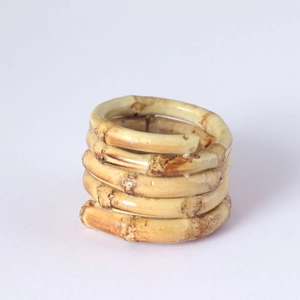 Natural woven bamboo napkin ring with multi-layer spiral design for dining tables