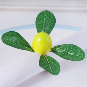 Portatovagliolo con limone artificiale e foglie verdi per decorazione tavola primaverile