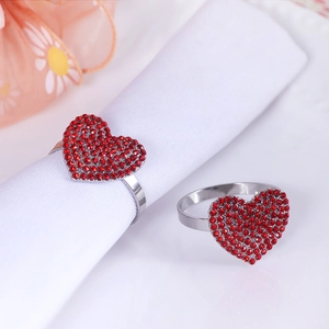 Elegant silver heart napkin rings with red rhinestones set for romantic table decor