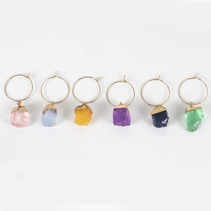 Set of six irregular natural raw stone wine glass rings with gold metal hoops and charms