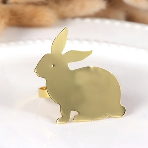 Golden bunny metal napkin ring with brushed texture for Easter table setting decor