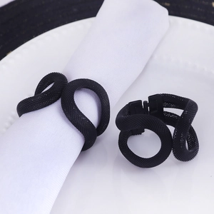 Modern black mesh metal napkin ring set with minimalist woven double ring design for dining