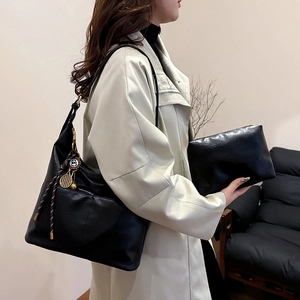 Black large capacity faux leather tote bag with tennis charm and matching pouch